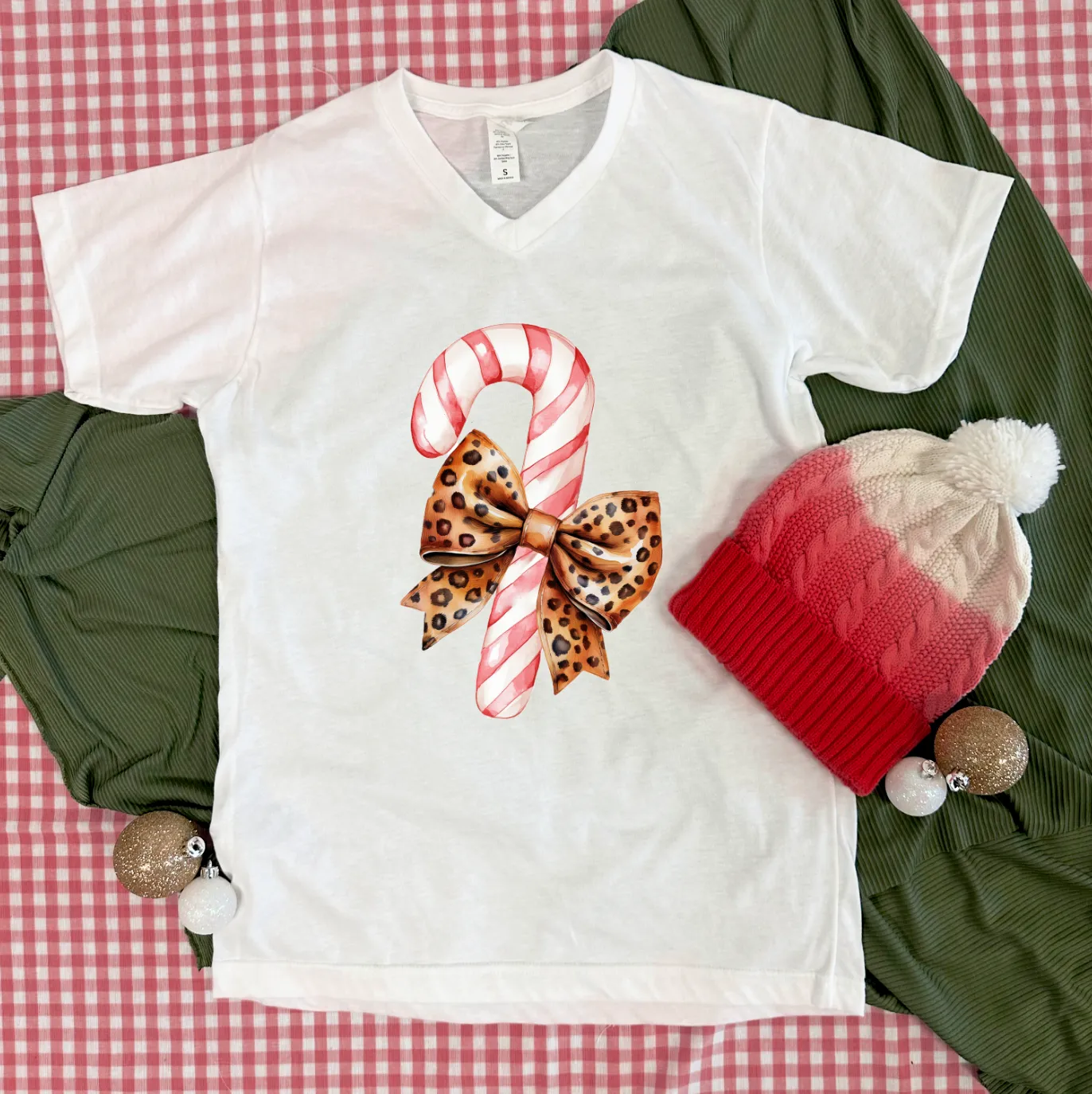 BLACK FRIDAY 2024: Candy Cane & Leopard Bow (*MULTIPLE STYLES AVAILABLE: BASIC VNECK & CREW NECK, BELLA CANVAS VNECK & CREW NECK, COMFORT COLORS SHORT SLEEVE & LONG SLEEVE, SWEATSHIRT*)