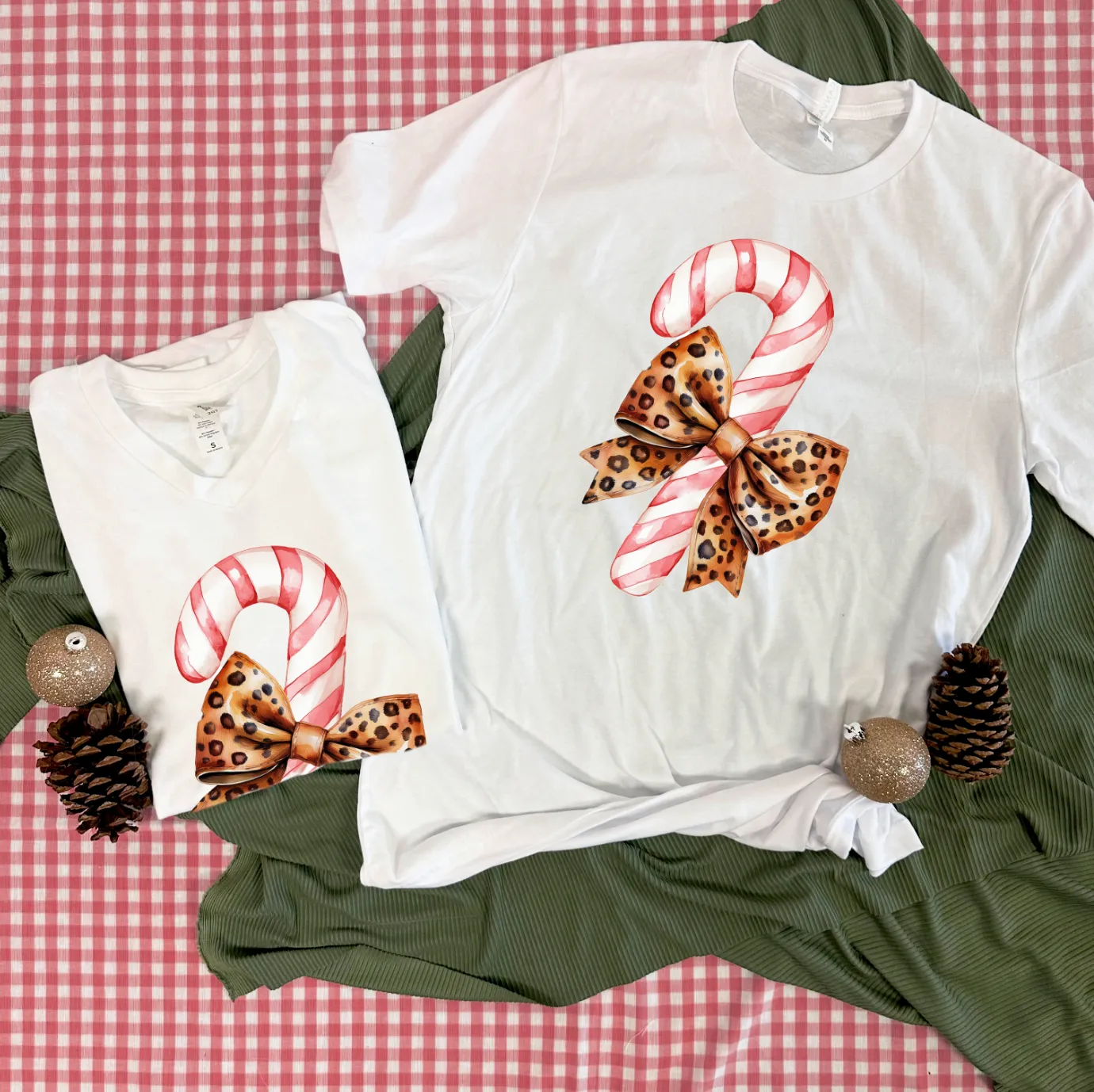 BLACK FRIDAY 2024: Candy Cane & Leopard Bow (*MULTIPLE STYLES AVAILABLE: BASIC VNECK & CREW NECK, BELLA CANVAS VNECK & CREW NECK, COMFORT COLORS SHORT SLEEVE & LONG SLEEVE, SWEATSHIRT*)