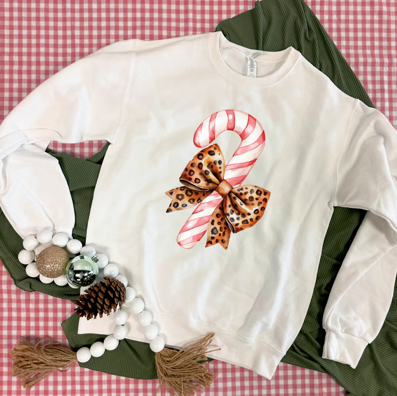 BLACK FRIDAY 2024: Candy Cane & Leopard Bow (*MULTIPLE STYLES AVAILABLE: BASIC VNECK & CREW NECK, BELLA CANVAS VNECK & CREW NECK, COMFORT COLORS SHORT SLEEVE & LONG SLEEVE, SWEATSHIRT*)