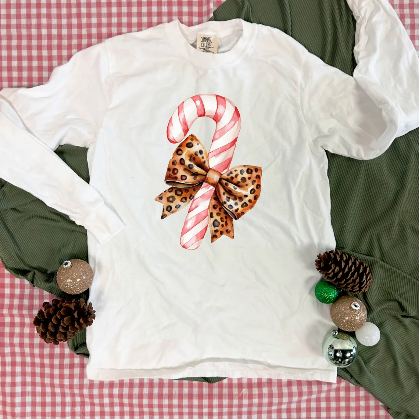 BLACK FRIDAY 2024: Candy Cane & Leopard Bow (*MULTIPLE STYLES AVAILABLE: BASIC VNECK & CREW NECK, BELLA CANVAS VNECK & CREW NECK, COMFORT COLORS SHORT SLEEVE & LONG SLEEVE, SWEATSHIRT*)