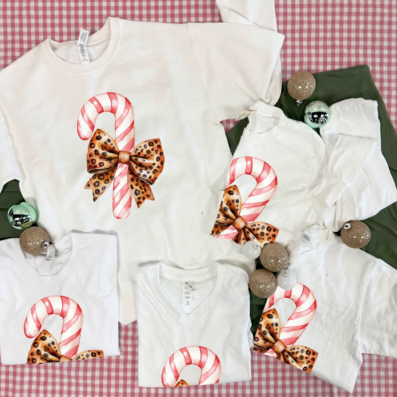 BLACK FRIDAY 2024: Candy Cane & Leopard Bow (*MULTIPLE STYLES AVAILABLE: BASIC VNECK & CREW NECK, BELLA CANVAS VNECK & CREW NECK, COMFORT COLORS SHORT SLEEVE & LONG SLEEVE, SWEATSHIRT*)